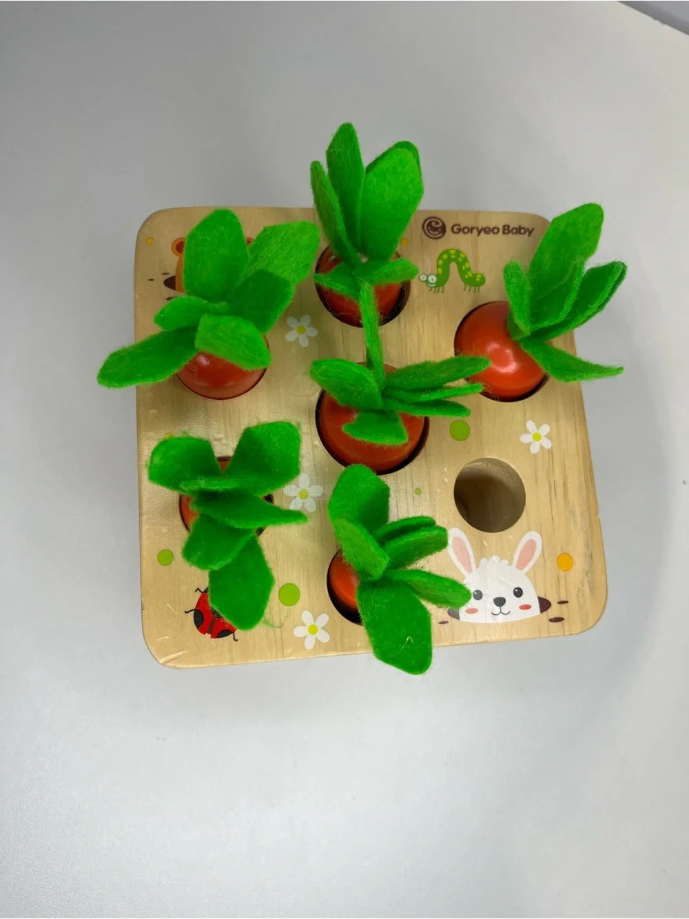 Wooden Pop-Up Garden Toy - Green & Orange Felt Leaves